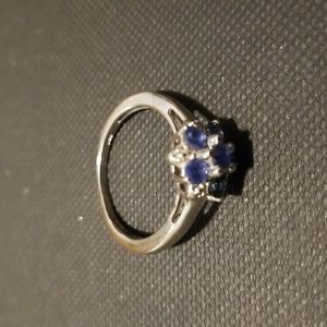 Sterling silver ring with blue stones in flower shape